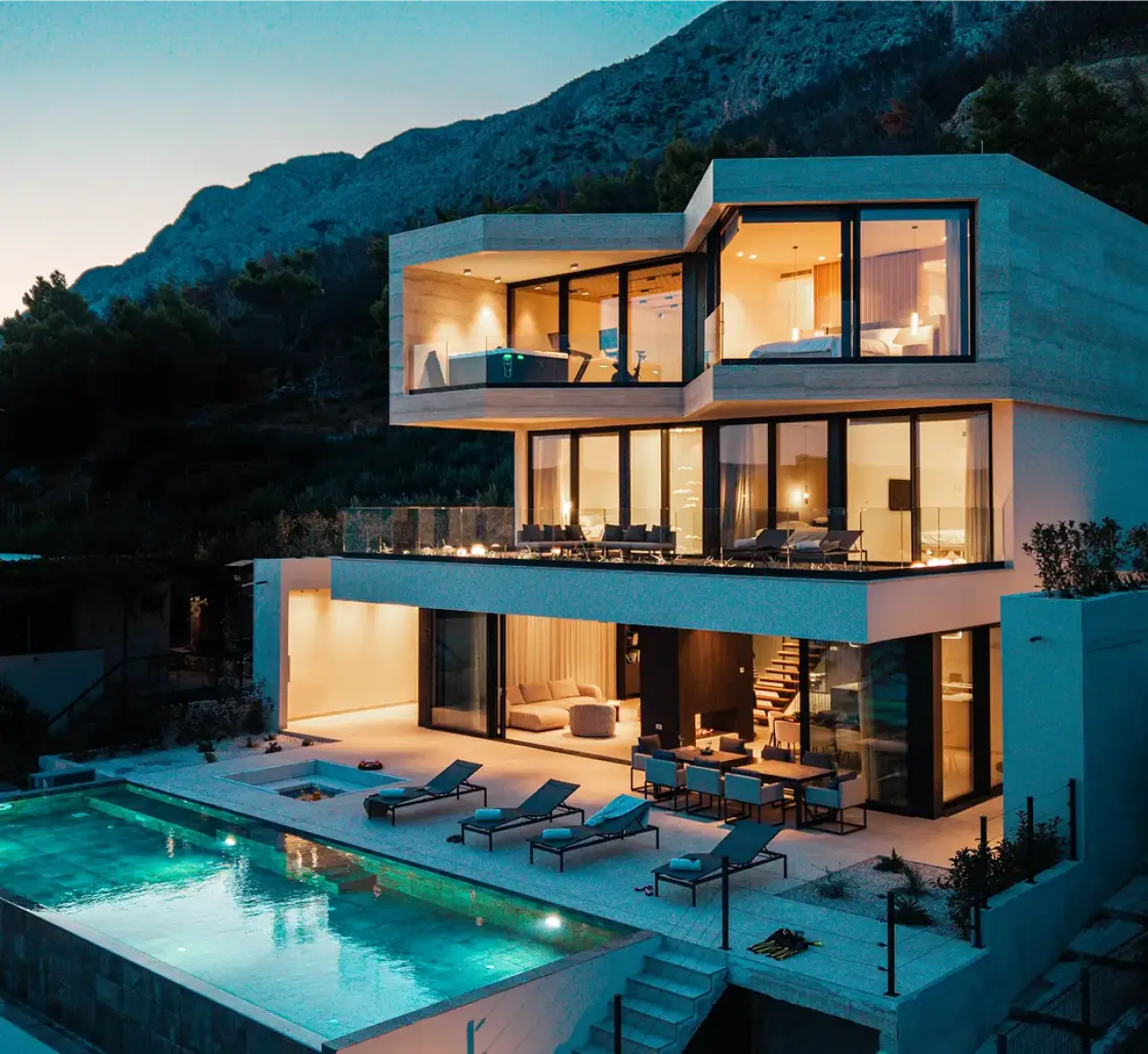 A luxury villa in the VIP Holiday Booker offering with a pool and illuminated terrace